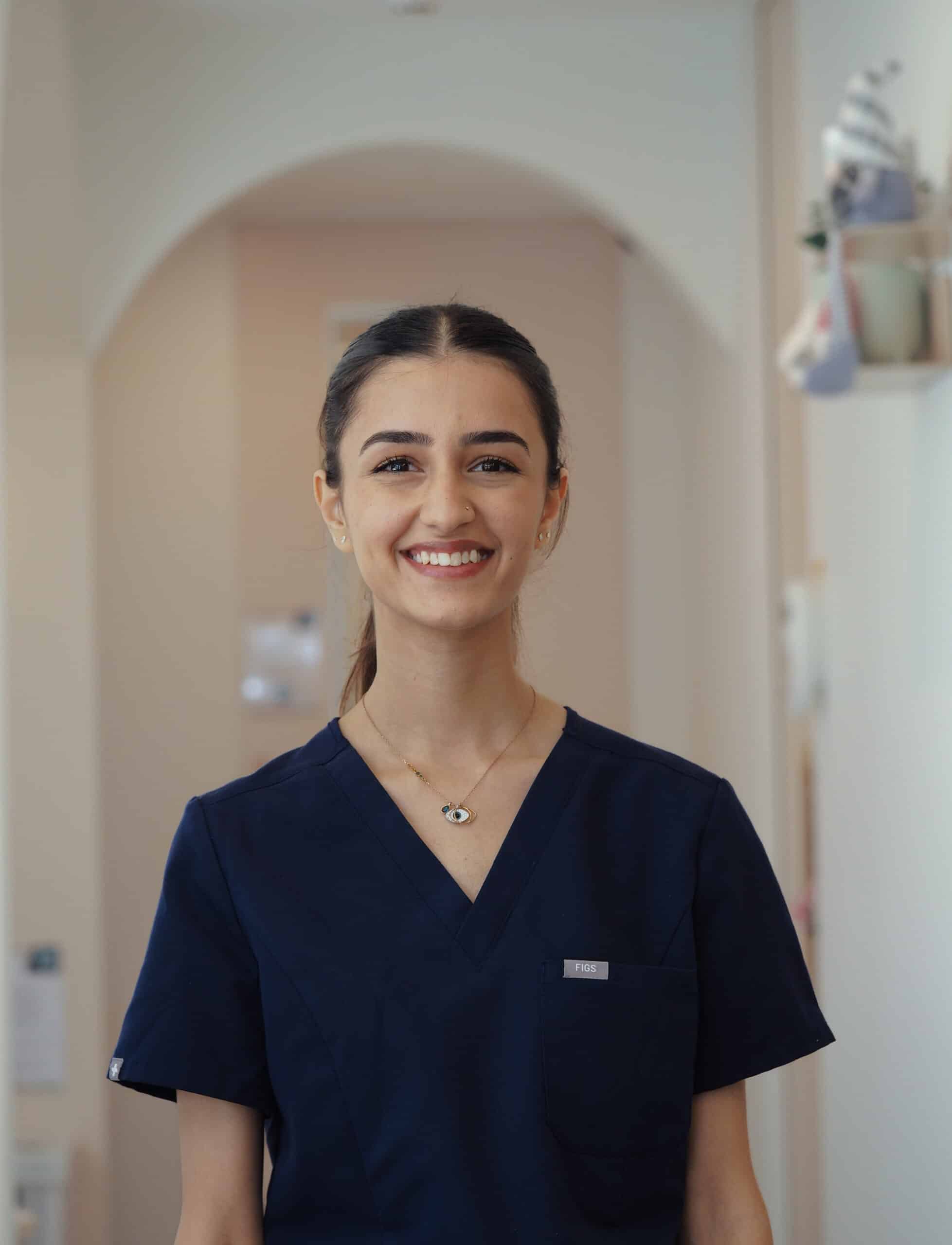 A cheerful dentist from Chomp Dental
