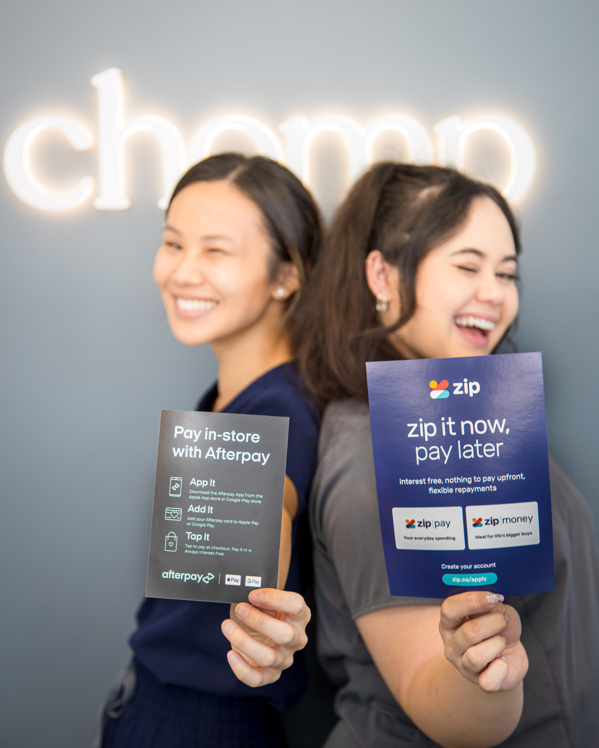 Chomp Dental staff showing different financing options for patient dental procedures